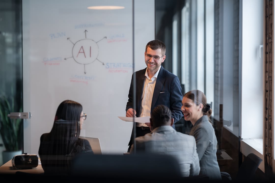 business team in a modern office during a meeting discussing AI