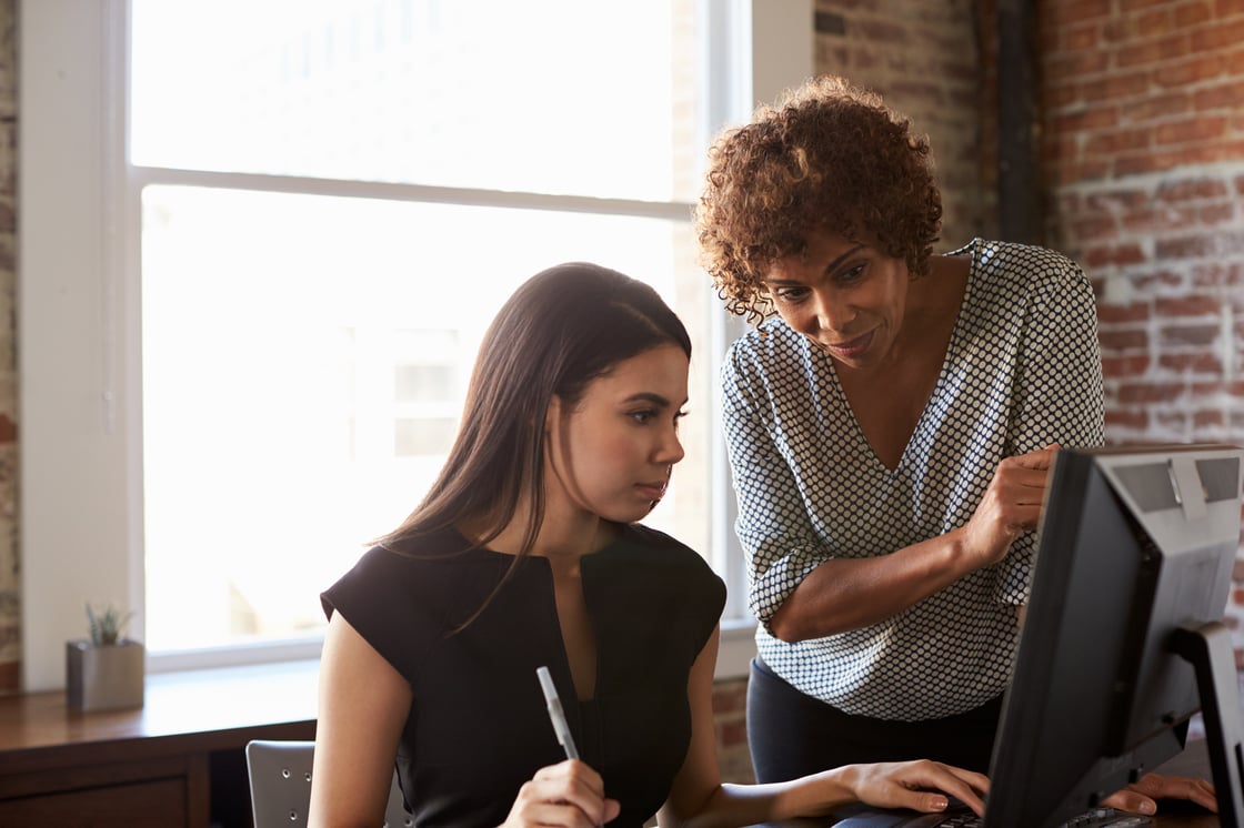 Woman mentoring student